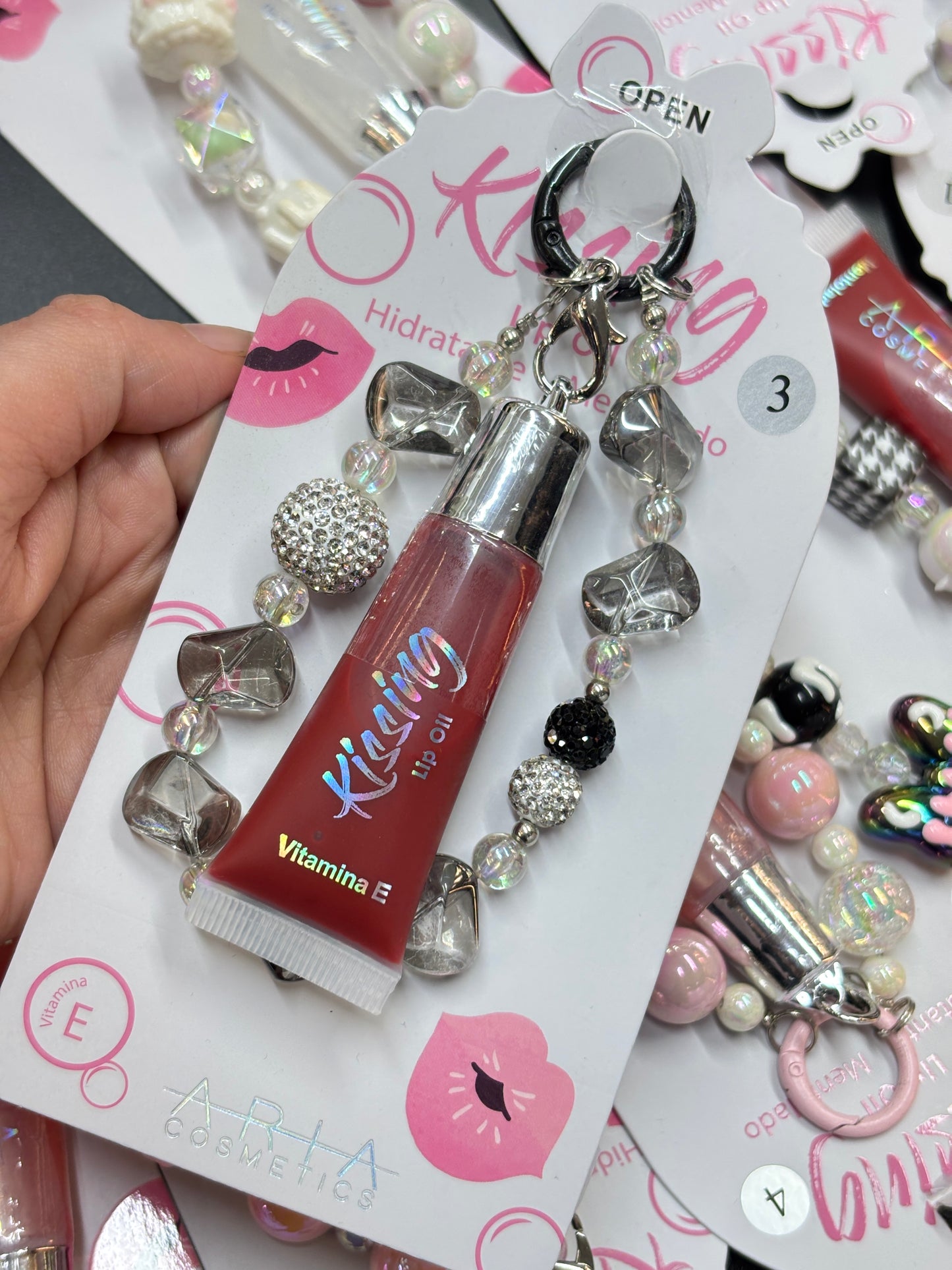 Brillo de labios + llavero ARIA COSMETICS