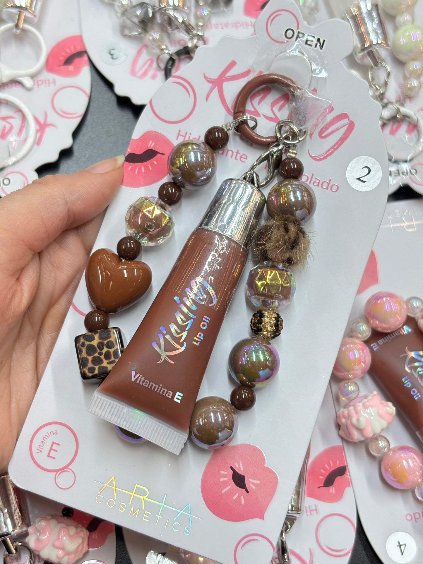 Brillo de labios + llavero ARIA COSMETICS